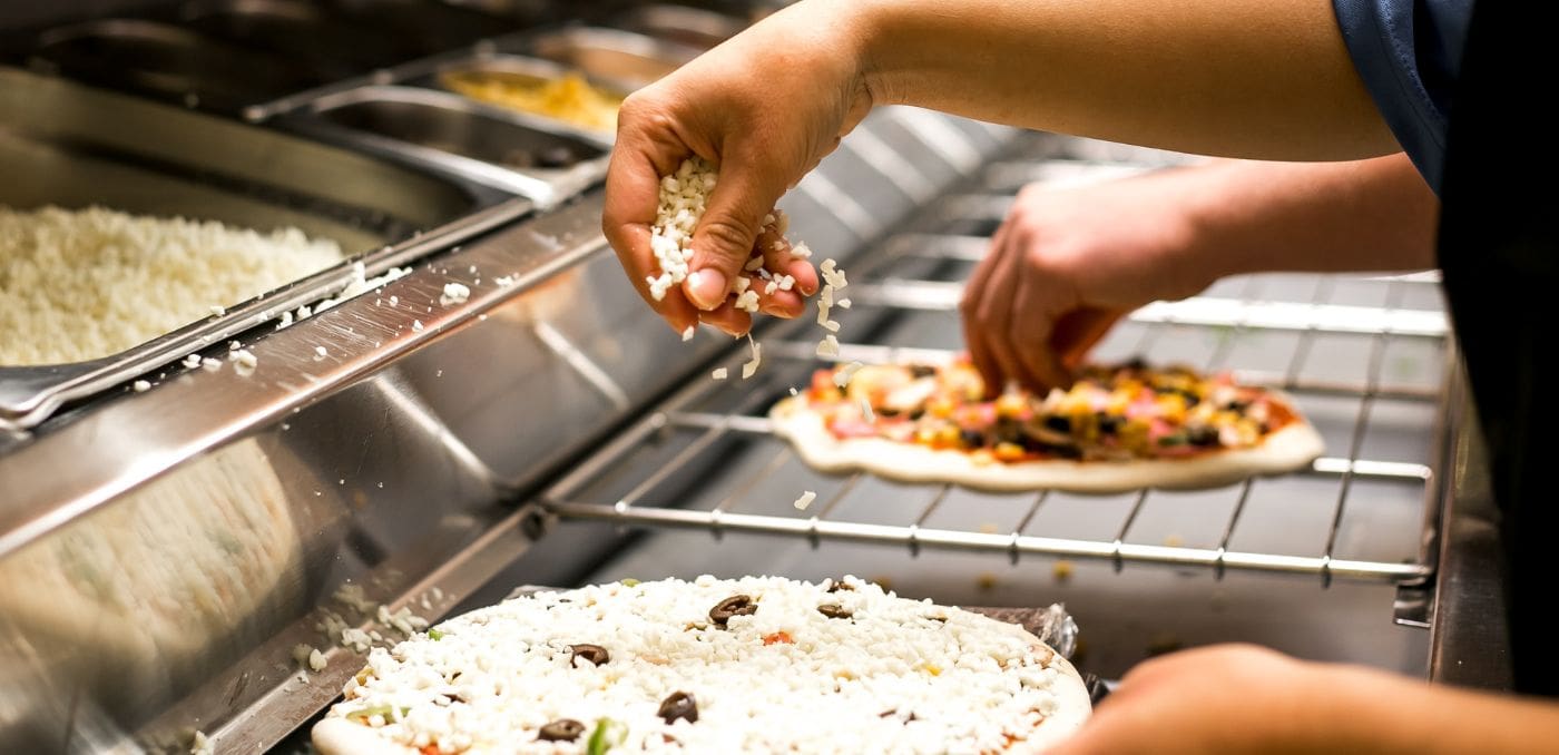 pizza prep fridge in use